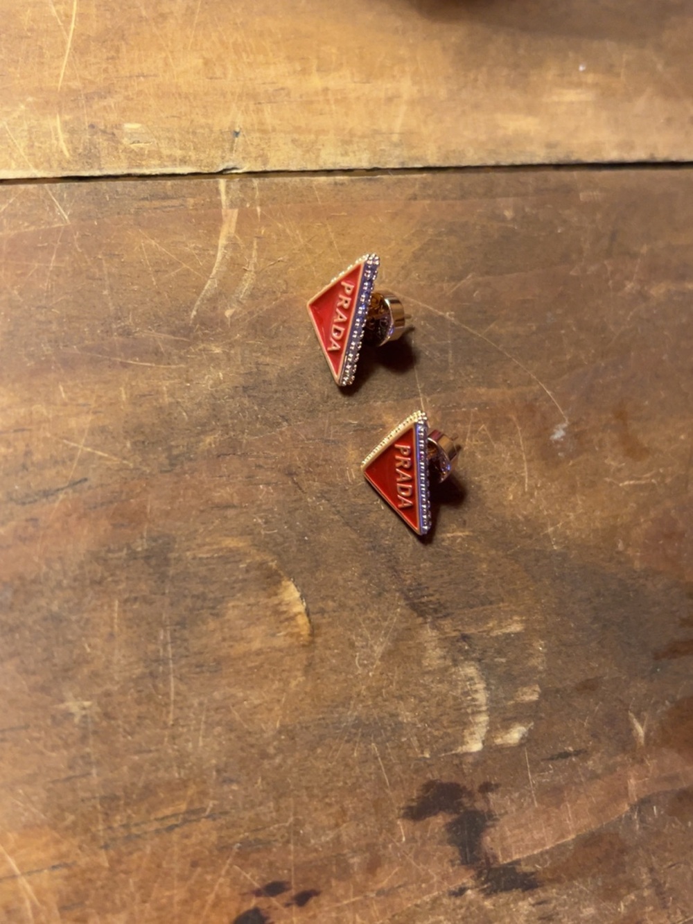 Prada Red Enamel Triangle Logo Earrings with Gold Trim